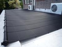 Heliocol Solar Pool Heating System - 6 Medium Panels on Flat Roof Heliocol Solar Pool Heating System - 6 Medium Panels on Flat Roof